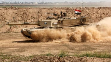 An Iraqi Army tank prepares to attack ISIS extremists in Tikrit, 130 kilometers north of Baghdad, March 13, 2015. (AP)