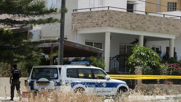Cypriot police cordon off the house of a Lebanese man holding a Canadian passport in the Cypriot coastal city of Larnaca where more than 400 boxes of ammonium nitrate -- a fertiliser that when mixed with other substances can be used to make explosives -- was discovered, on May 28, 2015. AFP