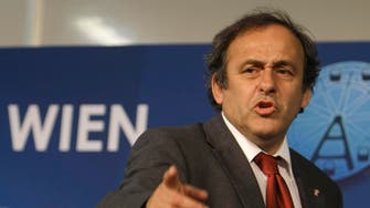 Platini says he wants to tone down politics at FIFA
