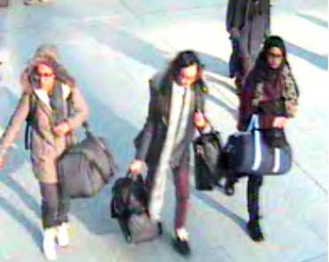 In this still taken from CCTV issued by the Metropolitan Police in London on Feb. 23, 2015, 15-year-old Amira Abase, left, Kadiza Sultana,16, center, and Shamima Begum, 15, walk through Gatwick airport, south of London, before catching their flight to Turkey on Tuesday Feb 17, 2015. (AP)