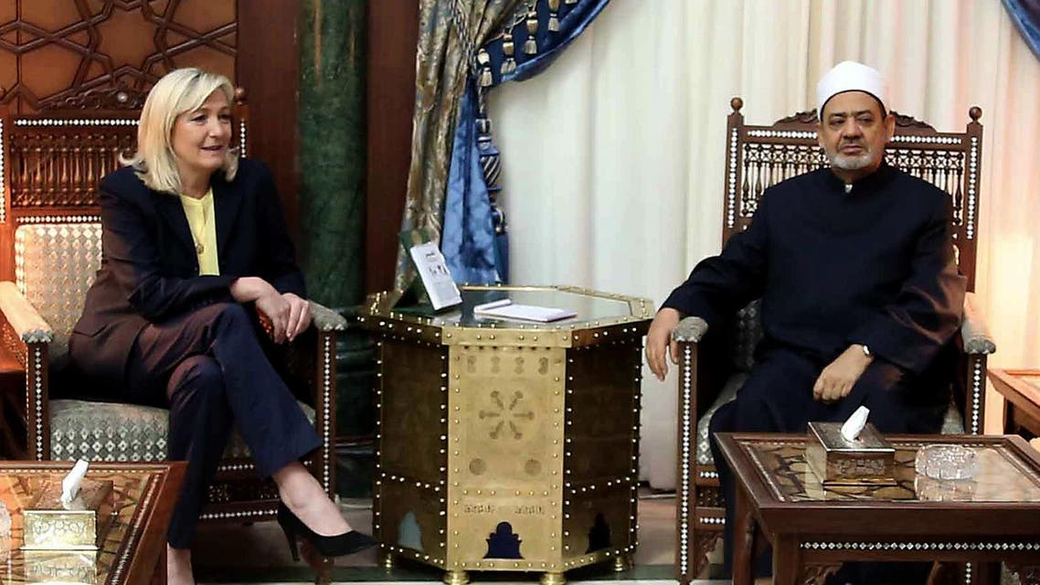 Egyptian grand Imam of al-Azhar Sheikh Ahmed el-Tayeb (R) meets with the leader of the French far-right Front National party Marine Le Pen (L), in al-Azhar headquarters in Cairo on May 28, 2015. AFP