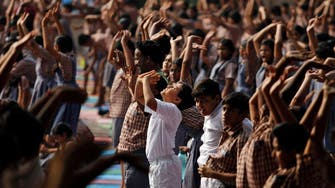 India tells bureaucrats to stretch with yoga-loving PM              