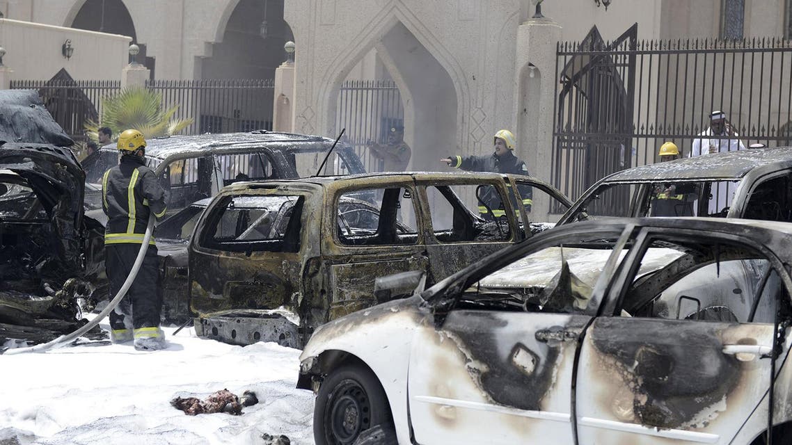 Firemen work at the site where a car exploded near a Shi'ite mosque in Saudi Arabia's Dammam May 29, 2015. Reuters