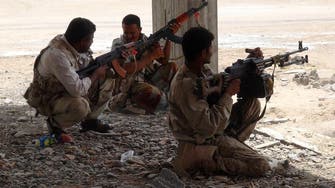 Fighters battle Houthis in Yemen's Aden