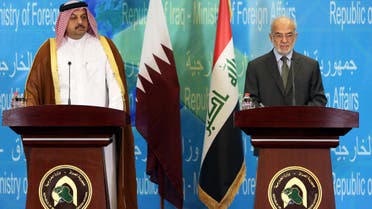 Qatari Foreign Minister Khalid bin Mohammed al-Attiyah, left, and his Iraqi counterpart Ibrahim al-Jaafari attend a press conference in Baghdad, Iraq, Friday, May 29, 2015. (AP)