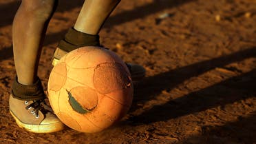 A young boy controls the ball while playing soccer with others, on a dusty field in Thokoza township east of Johannesburg, South Africa, Thursday, May 28, 2015. (File: AP)