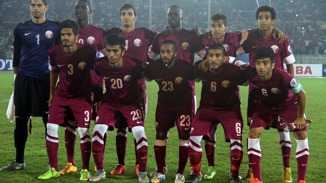 Players of Qatar Asian Football Confederation (AFC) U-19 team pose for a photo before their soccer match with Myanmar at Thuwunna stadium Monday, Oct 20, 2014, in Yangon, Myanmar. Qatar beat Myanmar 3-2. (AP Photo/Khin Maung Win)