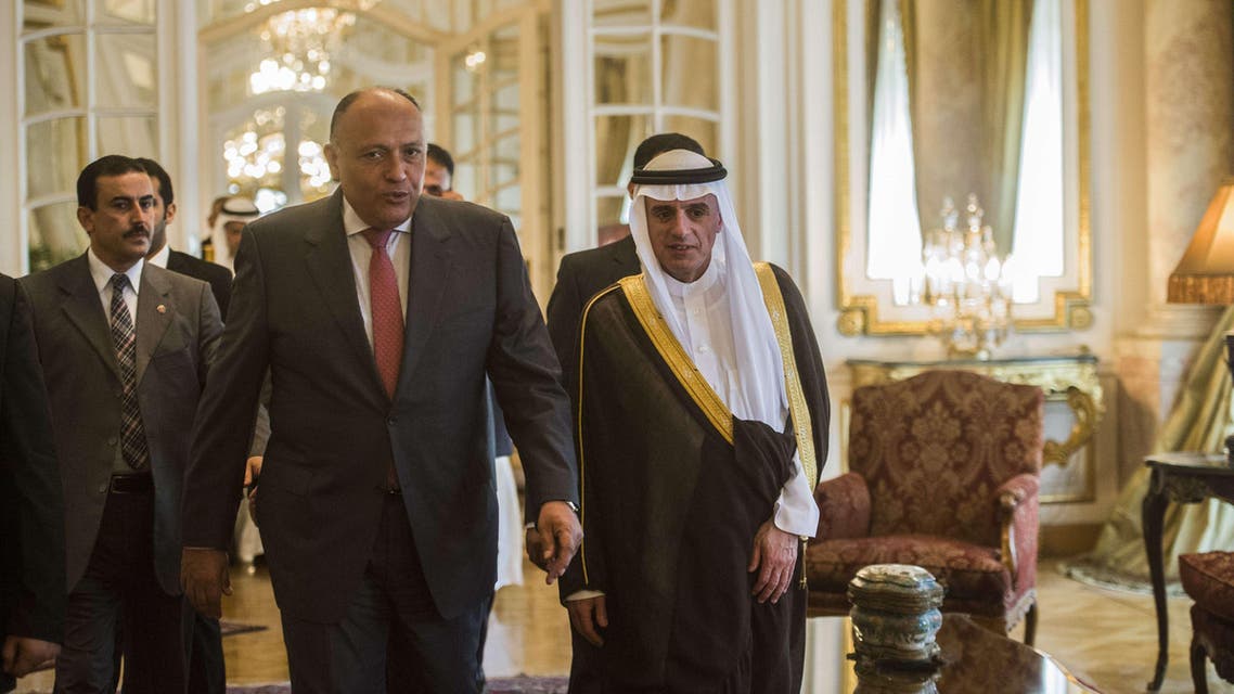 Egyptian Foreign Minister Sameh Shoukri (C-L) and his newly appointed Saudi counterpart, Adel al-Jubeir, arrive for a joint press conference following their meeting in Cairo on May 31, 2015. AFP