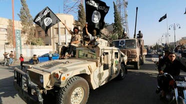 ISIS militants seen parading in a Humvee (Photo courtesy of Twitter)