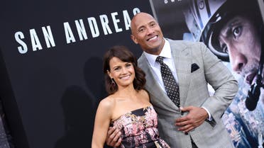 Carla Gugino, left, and Dwayne Johnson arrive at the premiere of "San Andreas" at the TCL Chinese Theatre on Tuesday, May 26, 2015, in Los Angeles. (Photo by Richard Shotwell/Invision/AP)