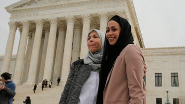 Samantha Elauf (R), who was denied a sales job at an Abercrombie Kids store in Tulsa in 2008, stands with her mother Majda outside the U.S. Supreme Court in Washington. (File: Reuters)