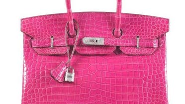 The shiny pink bag was sold to an Asian phone bidder in an auction that saw "fast-paced bidding from start to finish"