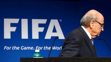 FIFA President Sepp Blatter leaves after his statement during a news conference at the FIFA headquarters in Zurich, Switzerland, June 2, 2015. Blatter resigned as FIFA president on Tuesday, four days after being re-elected to a fifth term. Blatter, 79, announced the decision at a news conference in Zurich, six days after the FBI raided a hotel in Zurich and arrested several FIFA officials. REUTERS/Ruben Sprich