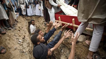 Shiite rebels known as Houthis bury a fellow Houthi who was killed in a Saudi-led airstrike during his funeral in Sanaa, Yemen, Monday, May 25, 2015. A United Nations-sponsored peace conference that was to take place at the end of the month has been indefinitely postponed, senior Yemeni politicians said. The latest setback came as jets from the Saudi-led coalition on Monday pounded Shiite rebel positions in the capital and across the country. (AP Photo/Hani Mohammed)