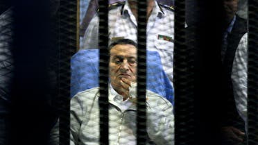 A file photo shows Egypt’s deposed President Hosni Mubarak attends a hearing session on April 15, 2013 during his retrial on appeal in Cairo, Egypt. (AP)
