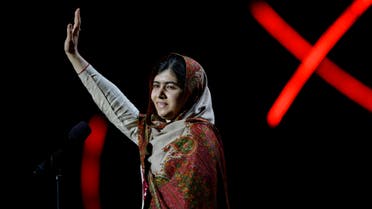 Joint-Nobel Peace Prize winner Malala Yousafzai from Pakistan waves as she arrives to speak on stage during the Nobel Peace Prize Concert in Oslo, Norway, Thursday, Dec. 11, 2014. AP