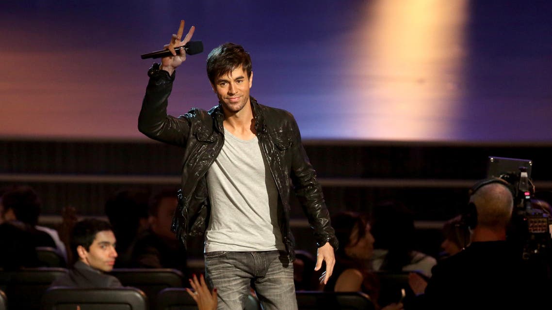 Enrique Iglesias announces nominees for album of the year at the Grammy Nominations Concert Live! in Los Angeles. (File Photo; AP)