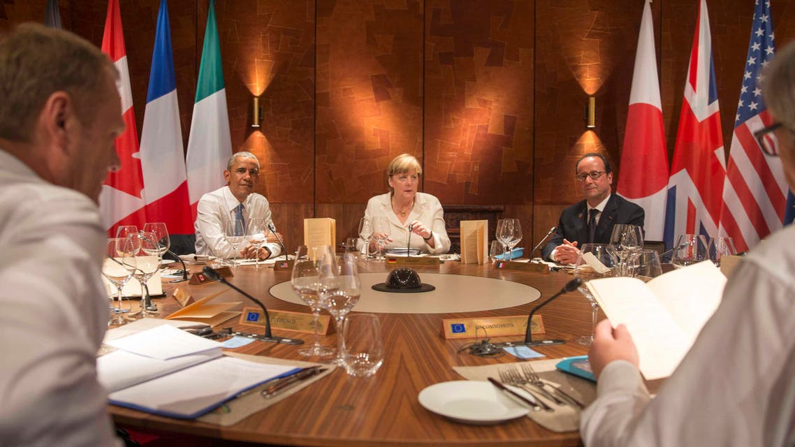U.S. President Barack Obama, Germany's Chancellor Angela Merkel and France's President Francois Hollande (L-R) attend a working dinner at a G7 summit at the hotel castle Elmau in Kruen, Germany, June 7, 2015. (Reuters)