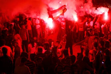 Supporters light flares as they celebrate early election results outside the pro-Kurdish Peoples' Democratic Party (HDP) headquarters in Diyarbakir, Turkey, June 7, 2015. (Reuters)
