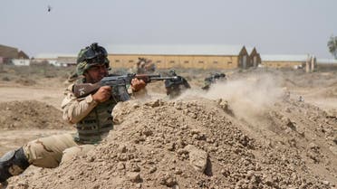 raqi soldiers train with members of the U.S. Army 3rd Brigade Combat Team, 82nd Airborne Division, at Camp Taji, Iraq, in this U.S. Army photo released June 2, 2015.  (Reuters)