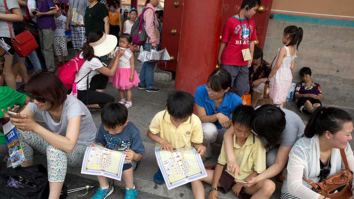 Children look at a map of the Forbidden City during a visit in Beijing. (File Photo: AP)