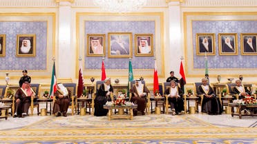 In this picture provided by the office of the Saudi Press Agency, King Salman of Saudi Arabia, center, welcomes Sayyid Shihab bin Tariq Al Said, Representative of Sultan Qaboos bin Said of Sultanate of Oman, third left, upon his arrival to Riyadh Airbase before the opening of Gulf Cooperation Council summit in Riyadh, Saudi Arabia, Tuesday, May 5, 2015. (Saudi Press Agency via AP)
