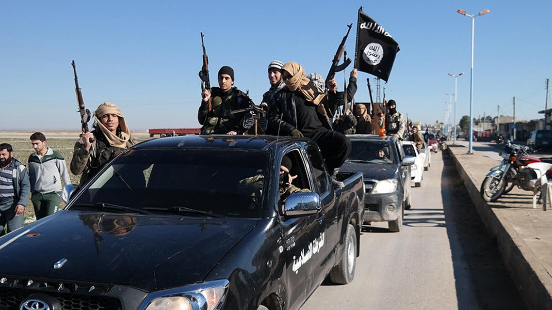 In this photo released on May 4, 2015, by a militant website, Islamic State militants pass by a convoy in Tel Abyad town, northeast Syria. (File Photo: AP)