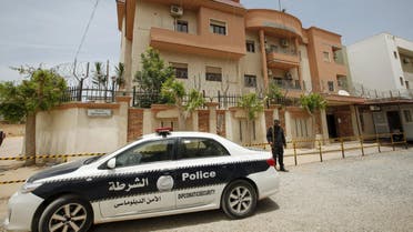 A police vehicle is seen parked in front of the Tunisian consulate in Tripoli, Libya June 13, 2015. (Reuters)