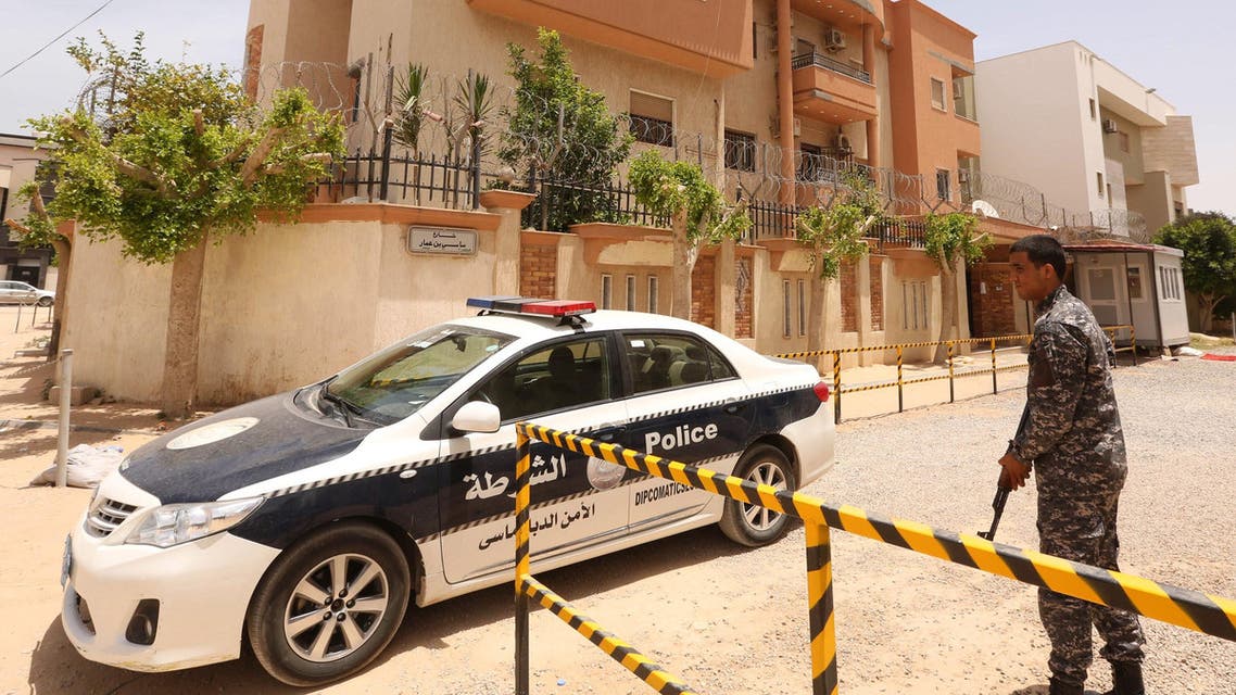 A policeman stands guard outside the Tunisian consulate in Tripoli on June 13, 2015. AFP