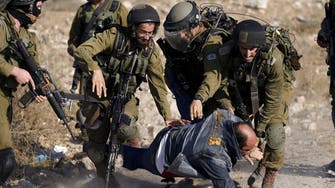 Israel opens probe into Palestinian beating video
