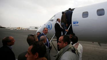 Yemeni political groups, including Shiite rebels known as Houthis, get on an airplane for Geneva for U.N.-led peace talks at the airport in Sanaa, Yemen, Sunday, June 14, 2015. AP