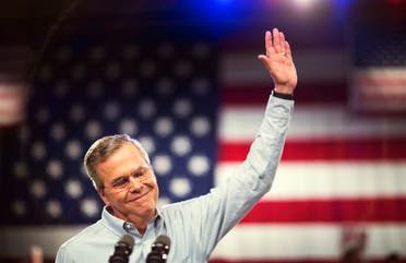 Former Florida Gov. Jeb Bush waves as he takes the stage to formally join the race for president, Monday, June 15, 2015, at Miami Dade College in Miami. (AP Photo/David Goldman)