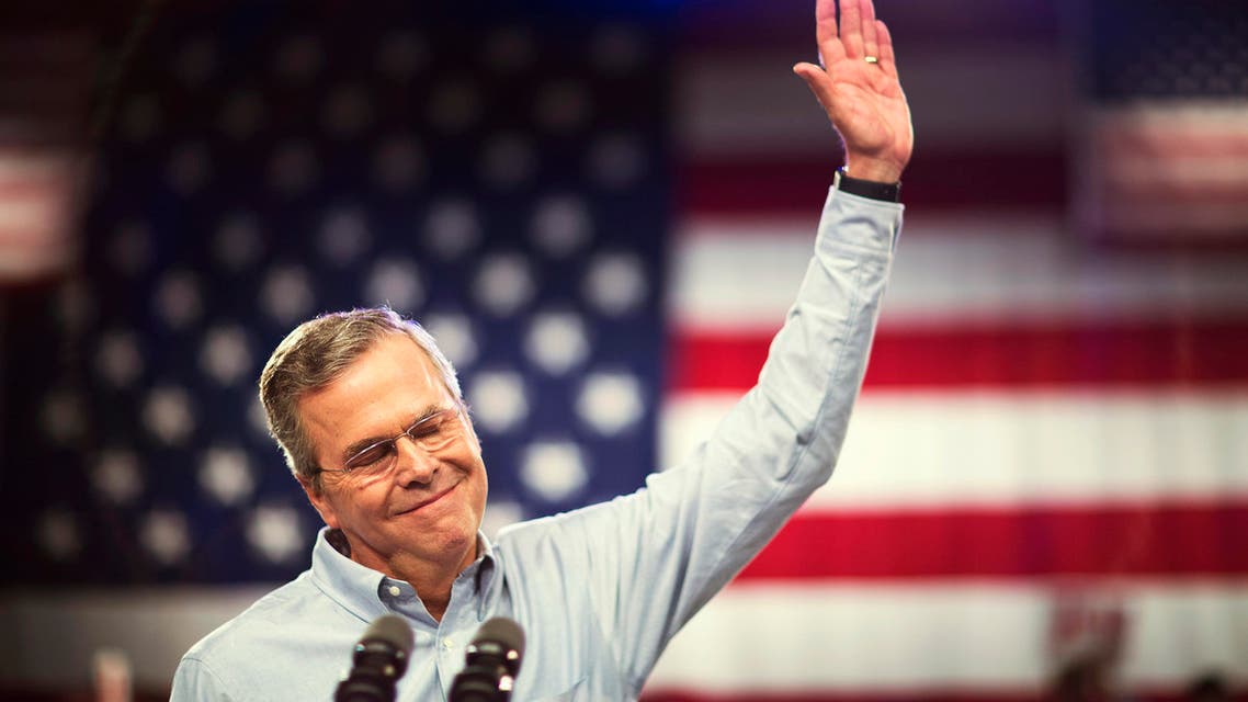 Former Florida Gov. Jeb Bush waves as he takes the stage to formally join the race for president, Monday, June 15, 2015, at Miami Dade College in Miami. (AP Photo/David Goldman)
