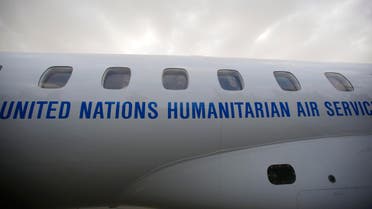 Yemeni political groups get on an airplane for Geneva for U.N.-led peace talks at the airport in Sanaa, Yemen, Sunday, June 14, 2015. (AP)