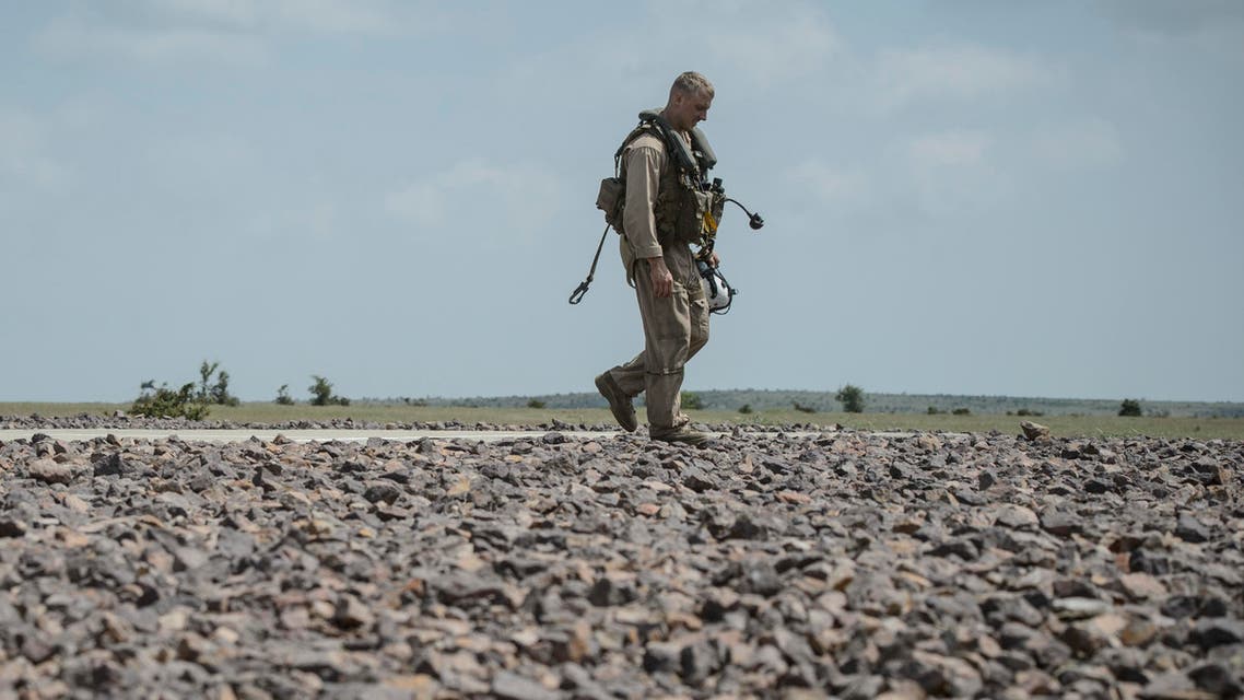 A United States marine walks during a joint military exercise with NATO Allies from Romania and Bulgaria, in Babadag Training Area, in Babadag, south-eastern Romania, Tuesday, May 26, 2015. (AP)