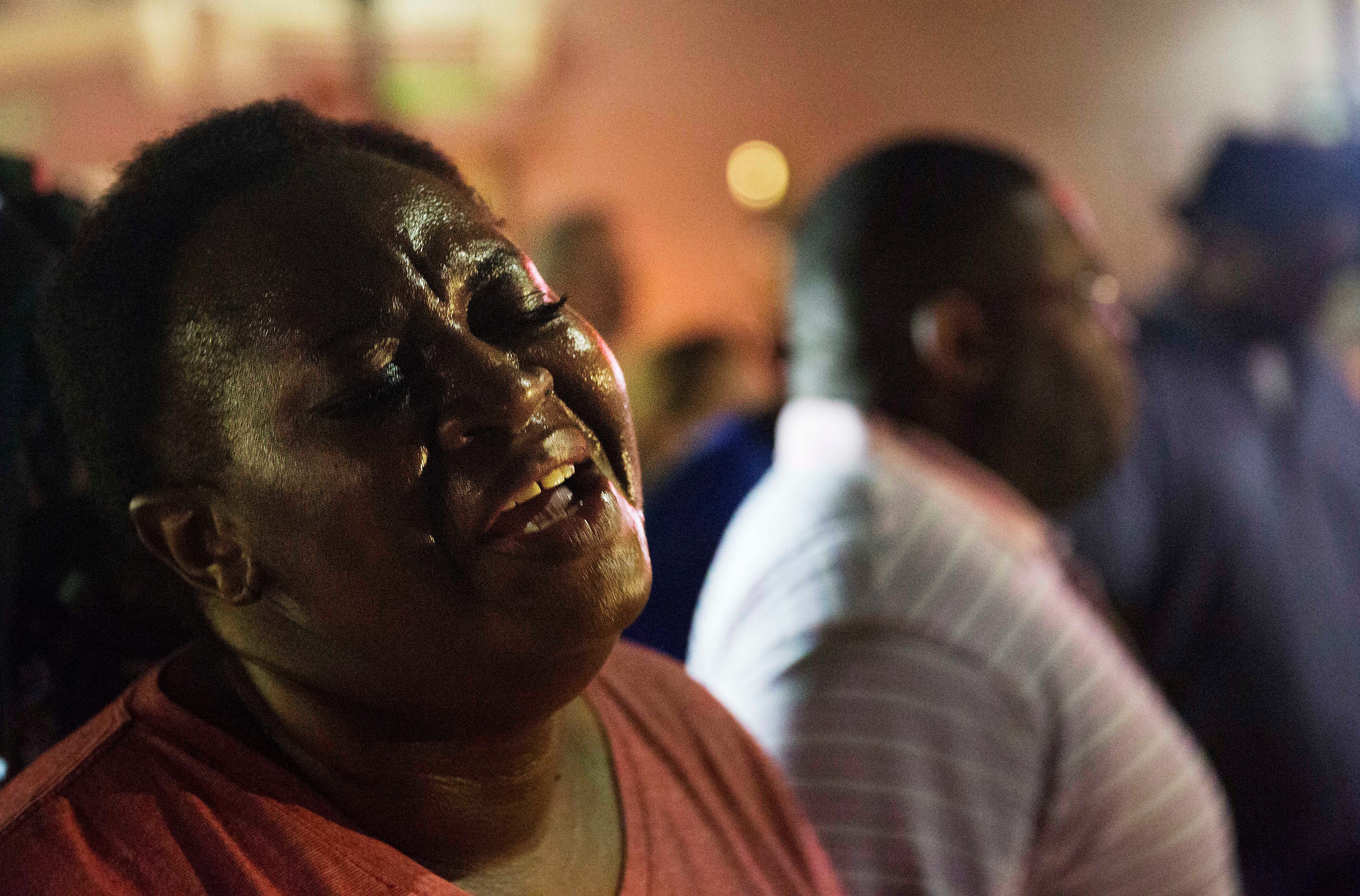 Lisa Doctor joins a prayer circle down the street from the Emanuel AME Church early Thursday, June 18, 2015 following a shooting Wednesday night in Charleston, S.C. (AP)