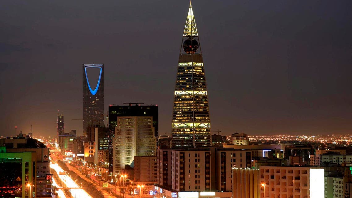In this Wednesday, Feb. 9, 2011 file photo, Saudi Arabian city view with the 'Kingdom Tower', background, and 'Al-Faislia Tower' in Riyadh. Saudi Arabia’s stock exchange has opened up to direct foreign investment for the first time. The decision to open up the Tadawul stock exchange on Monday comes at a crucial time for Saudi Arabia, whose revenue has taken a hit from the plunge in oil prices over the past year. The kingdom is the world’s largest exporter of crude. (AP Photo/Hassan Ammar, File)