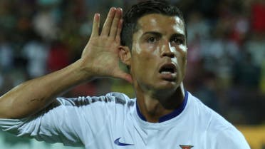 Portugal's Cristiano Ronaldo gestures after scoring the second goal during the Euro 2016 Group I qualifying match between Armenia and Portugal in Yerevan, Armenia, Saturday, June 13, 2015. (Hrant Khachatryan/PAN Photo via AP)