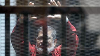 Egypt hands stiff jail terms to 23 Mursi supporters  