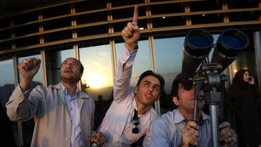 Iranians look at the sky with binoculars for the new moon that signals the start of the Islamic holy month of Ramadan. (File: AP)