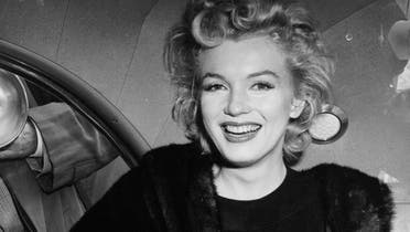 In this June 2, unknown year, file photo, actress Marilyn Monroe smiles in a car after arriving tousled from an all-night plane flight from Hollywood to Idlewild Airport, in New York. She said she planned to rest in New York before going to England to make a new movie with Sir Laurence Olivier. Sidestepping questions as to whether she and playwright Arthur Miller plan to wed, she said: "No comment, we're really good friends." (AP Photo, File)