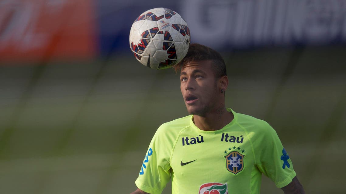 Brazil's player Neymar controls the ball during a team training session in Santiago, Chile, Friday, June 19, 2015. AP 