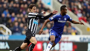 Chelsea's John Obi Mikel, right, vies for the ball with Newcastle United's Daryl Janmaat during their English Premier League soccer match at St James' Park, Newcastle, England. AP 