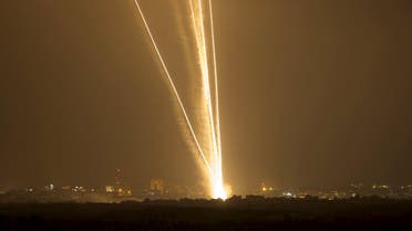 File photo of light streaks and smoke trails seen as rockets are launched from Gaza towards Israel. (Reuters)