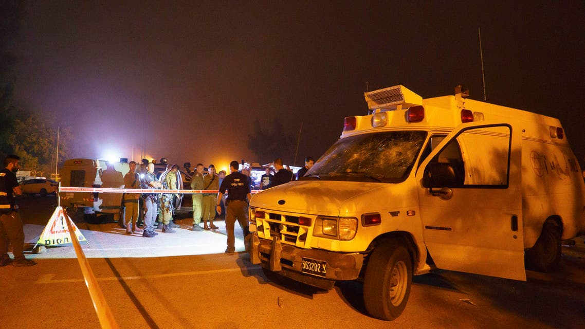 sraeli security forces stand guard around an ambulance which was attacked at the Golan Heights Tuesday, June 23, 2015. AP