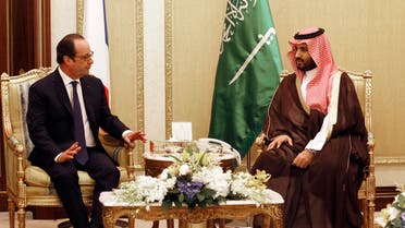 French President Francois Hollande, left, talks with Saudi Arabia’s Deputy Crown and Defense Minister Prince Moahmmed bin Salman, andduring a meeting in Riyadh, Saudi Arabia, Tuesday, May 5, 2015.