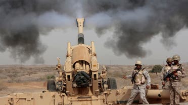 Saudi soldiers fire artillery toward three armed vehicles approaching the Saudi border with Yemen in Jazan, Saudi Arabia, Monday, April 20, 2015. AP