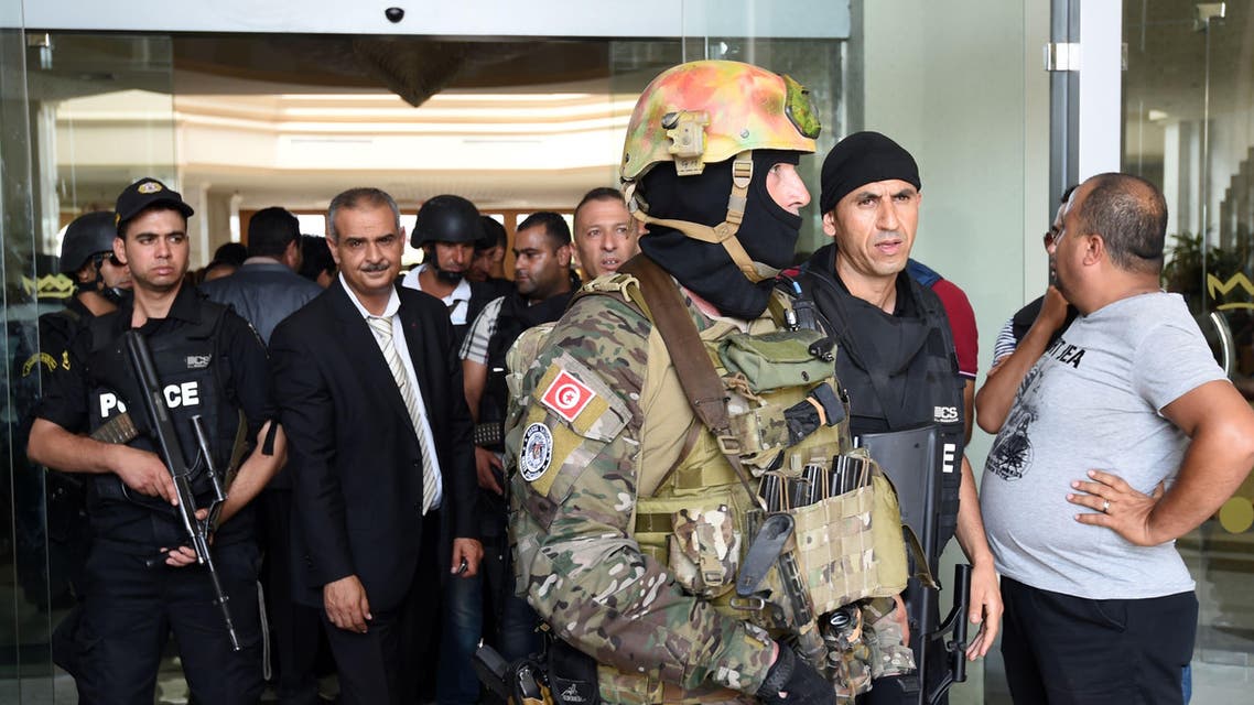 Tunisian security forces stand in front of the Imperial hotel in the resort town of Sousse, a popular tourist destination 140 kilometres (90 miles) south of the Tunisian capital, on June 26, 2015. (AFP)