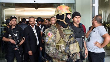  Tunisian security forces stand in front of the Imperial hotel in the resort town of Sousse, a popular tourist destination 140 kilometres (90 miles) south of the Tunisian capital, on June 26, 2015. (AFP)
