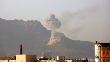 Smoke rises after a Saudi-led airstrike hit a site believed to be one of the largest weapons depot on the outskirts of Yemen's capital, Sanaa, on Wednesday, June 17, 2015. AP